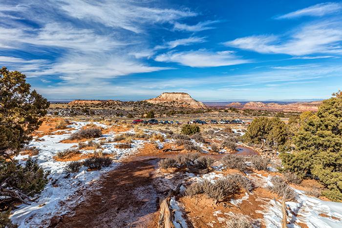 A view of the parking lot from the Mesa Arch trail, Canyonlands National Park / Rebecca Latson