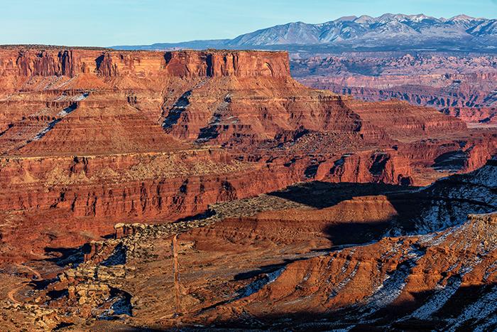 A late afternoon view into Shafer Canyon, Canyonlands National Park / Rebecca Latson