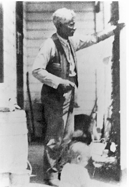 George McJunkin on a porch/NPS archives