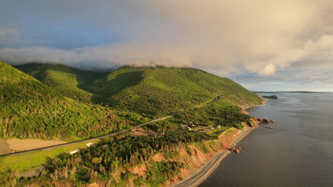 An aerial view of the new Mkwesaqtuk/Cap-Rouge Campground and the Cabot Trail on the western side of Cape Breton Highlands National Park.