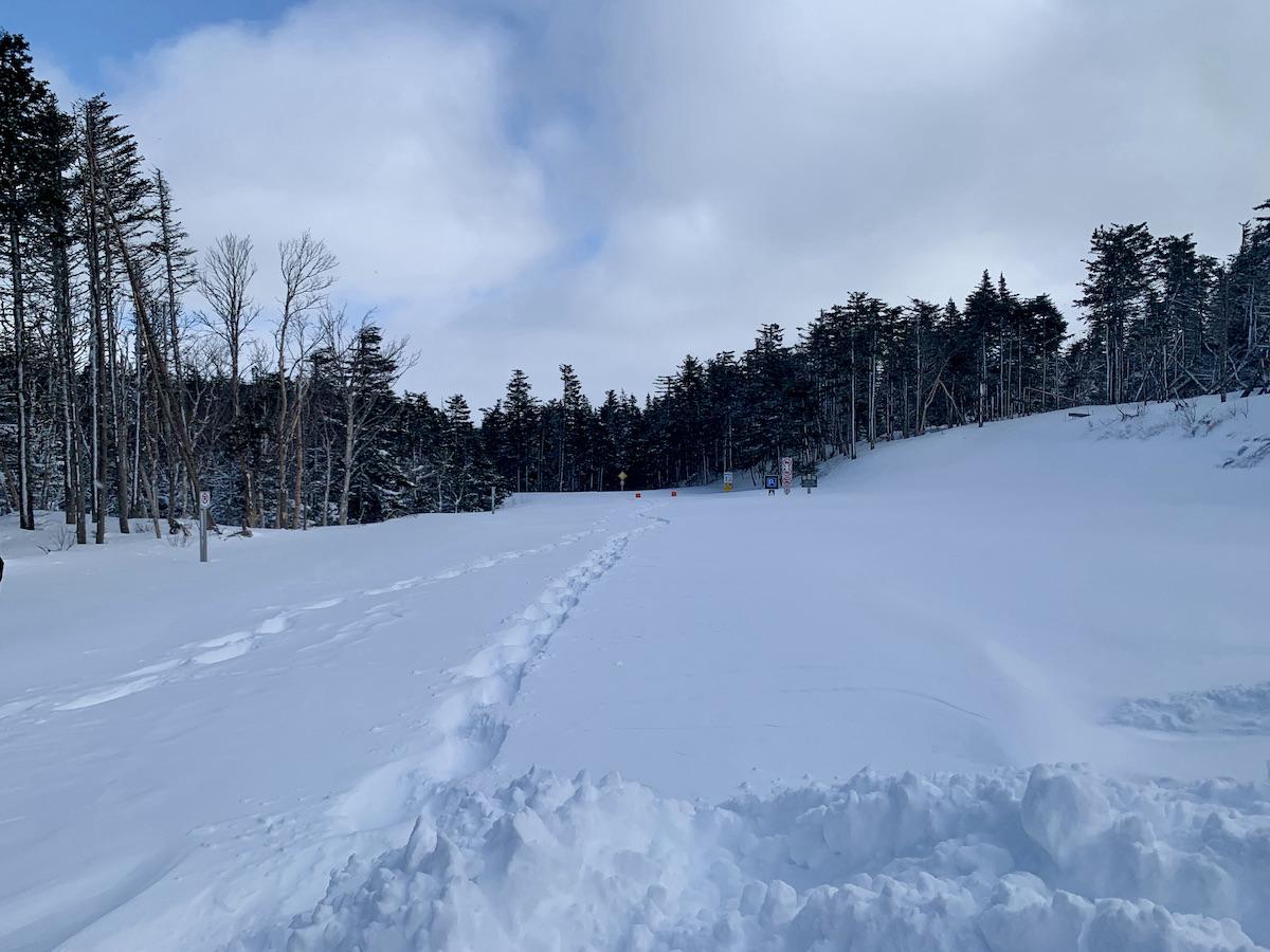 This part of Skyline's parking lot is not plowed when we start our snowshoe.