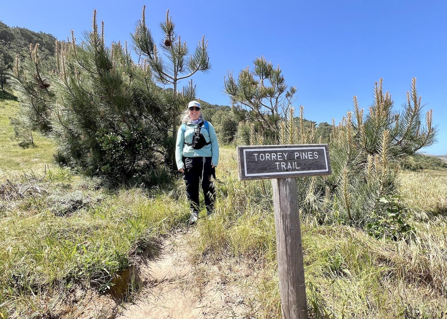 Leigh Baker Work, a naturalist with Lindblad Expeditions, hikes Torrey Pines Trail on Santa Rosa Island in Channel Islands National Park.