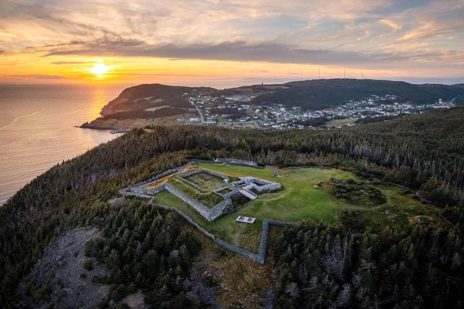 The sun sets on Castle Hill National Historic Site in Placentia, Newfoundland and Labrador.