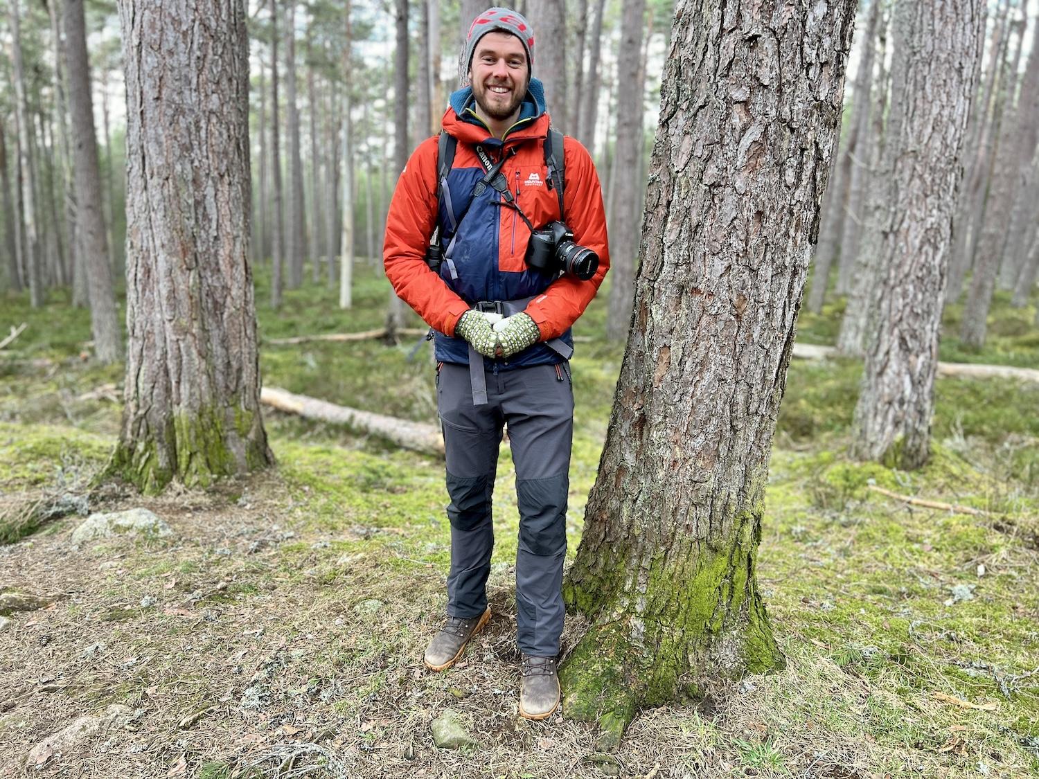 Wilderness Scotland guide Joe Mann stands in the Carolinian pine forest of Abernethy National Nature Reserve.