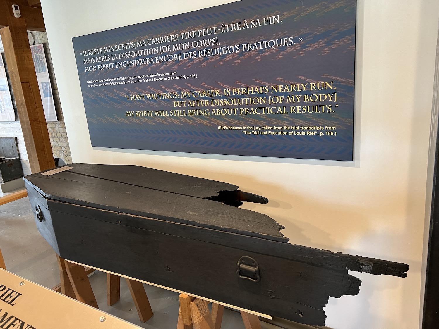 The charred coffin that Louis Riel's body was first placed in is now at Le Musée de Saint-Boniface Museum.
