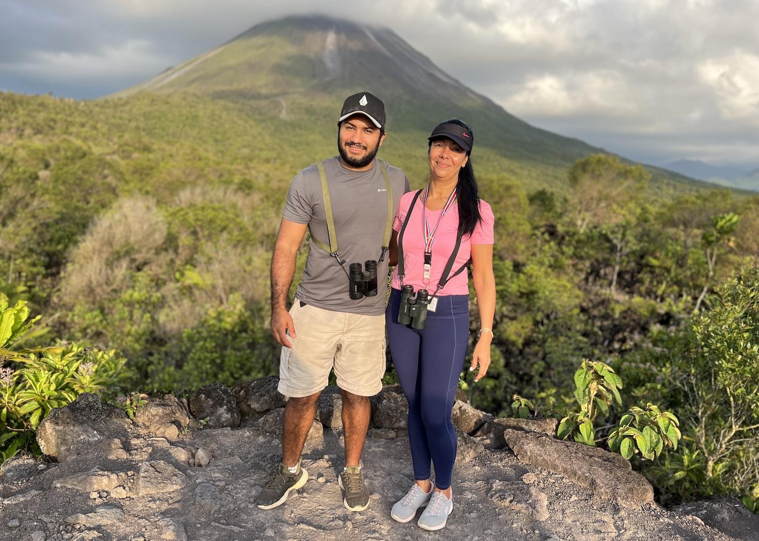 Jarvin Morra and Rebecca Gómez are shown while hiking in Arenal 1968 next to Arenal Volcano National Park.