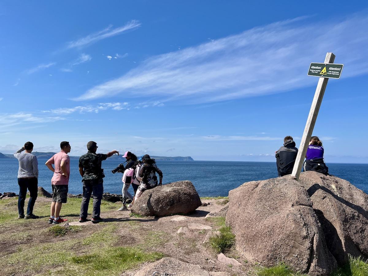 At Cape Spear Lighthouse National Historic Site one July day, visitors look for whales.