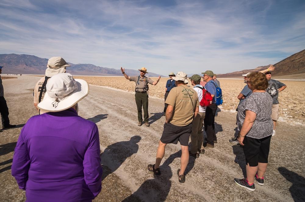 A park ranger delivers an interpretive ranger program at Badwater Basin