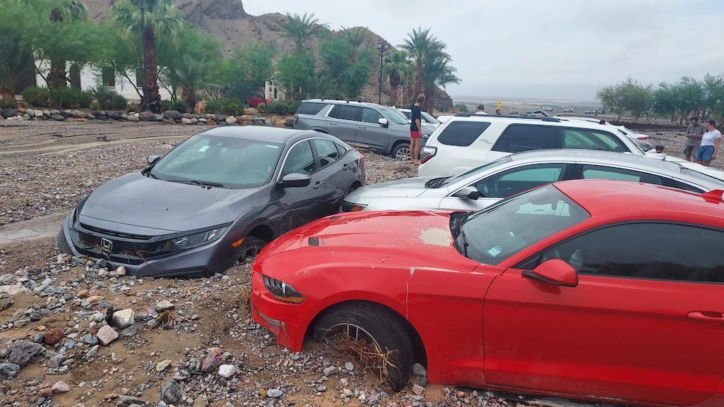 Heavy rains sent floodwaters across parts of Death Valley on Friday, damaging dozens of vehicles and trapping visitors and employees inside the park/NPS