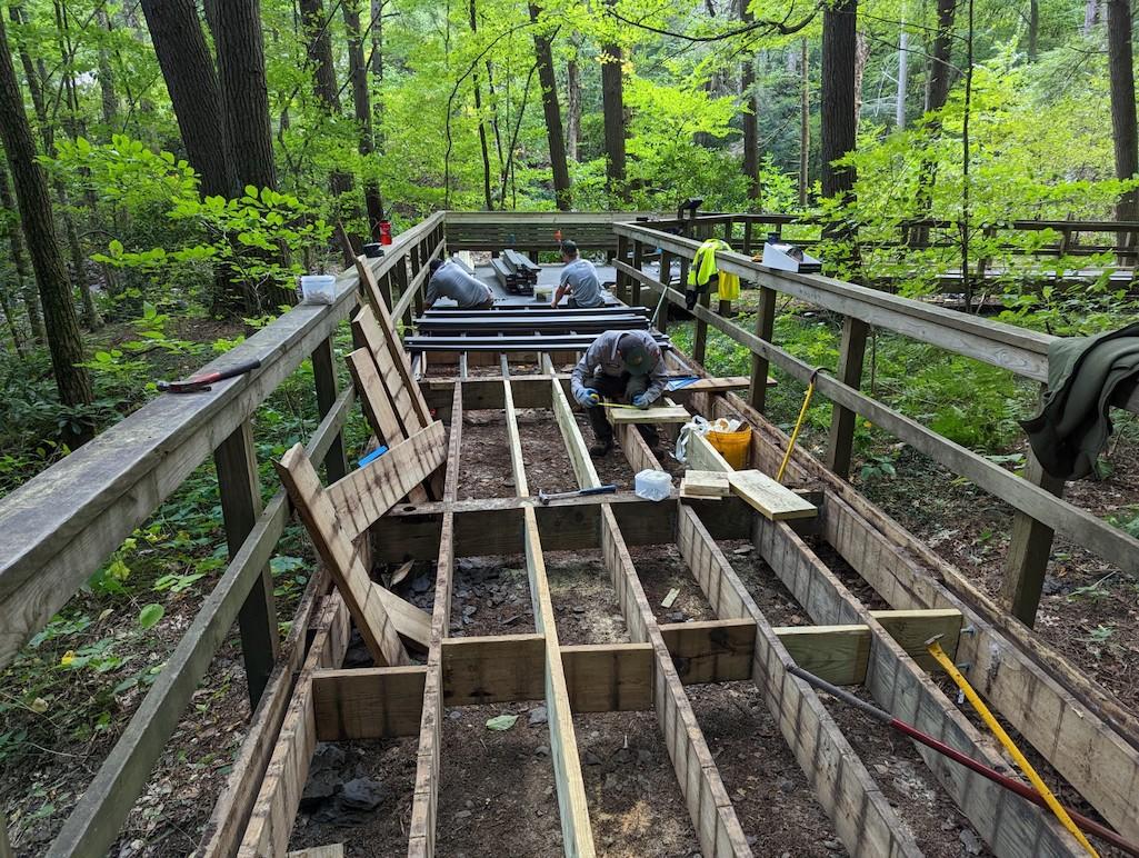 The park's trail crew makes repairs to the popular Dingmans Falls Boardwalk Trail during the summer of 2022.  Work resumes next week/NPS
