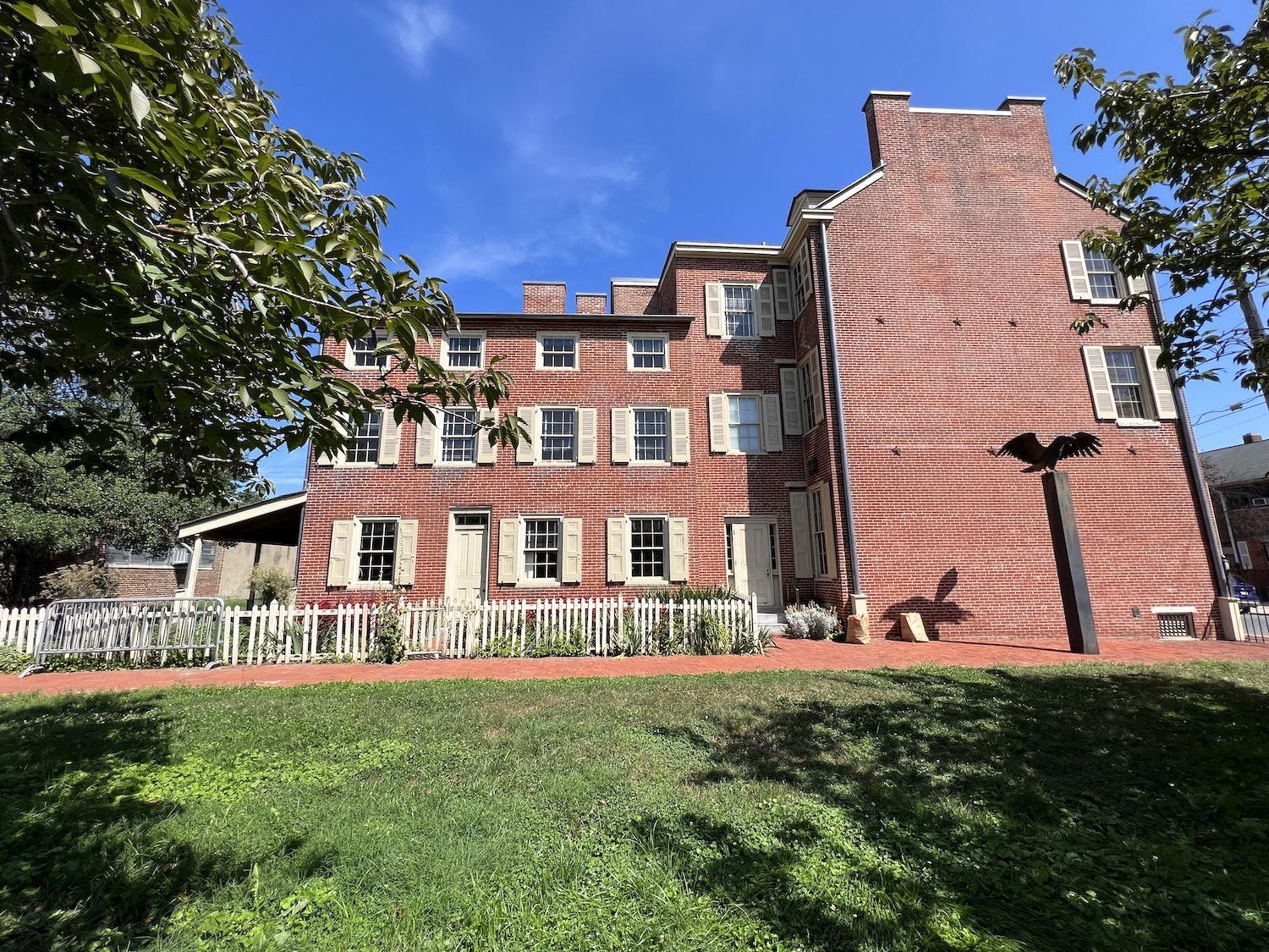 The Poe House complex includes gardens and green space.