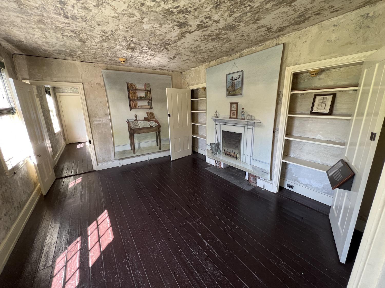 With the help of art, you can imagine the time when this was Edgar Allan Poe's parlor.