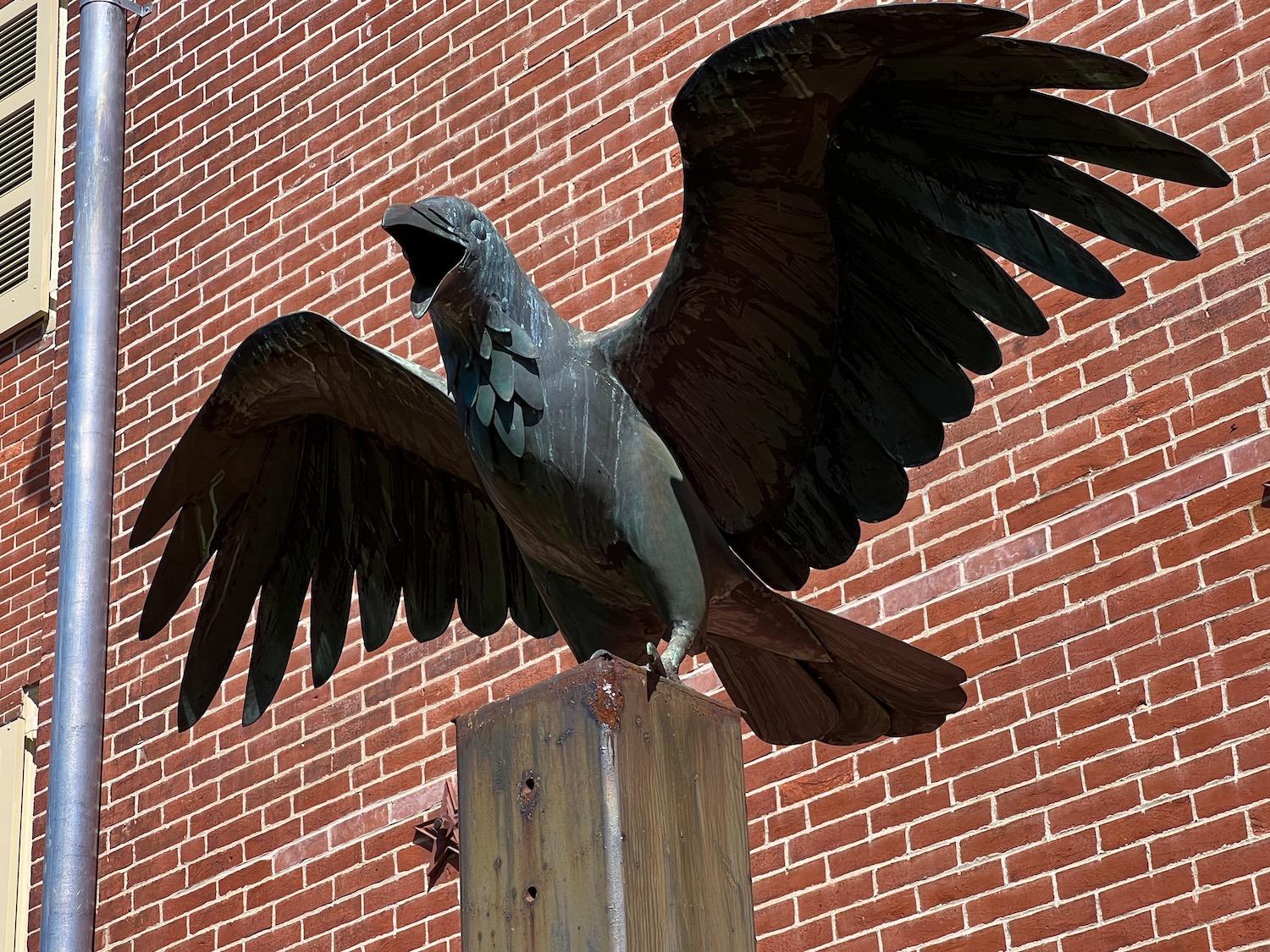 David Caccia's sculpture of a raven casts a shadow over Edgar Allan Poe's former Philadelphia home in certain light.