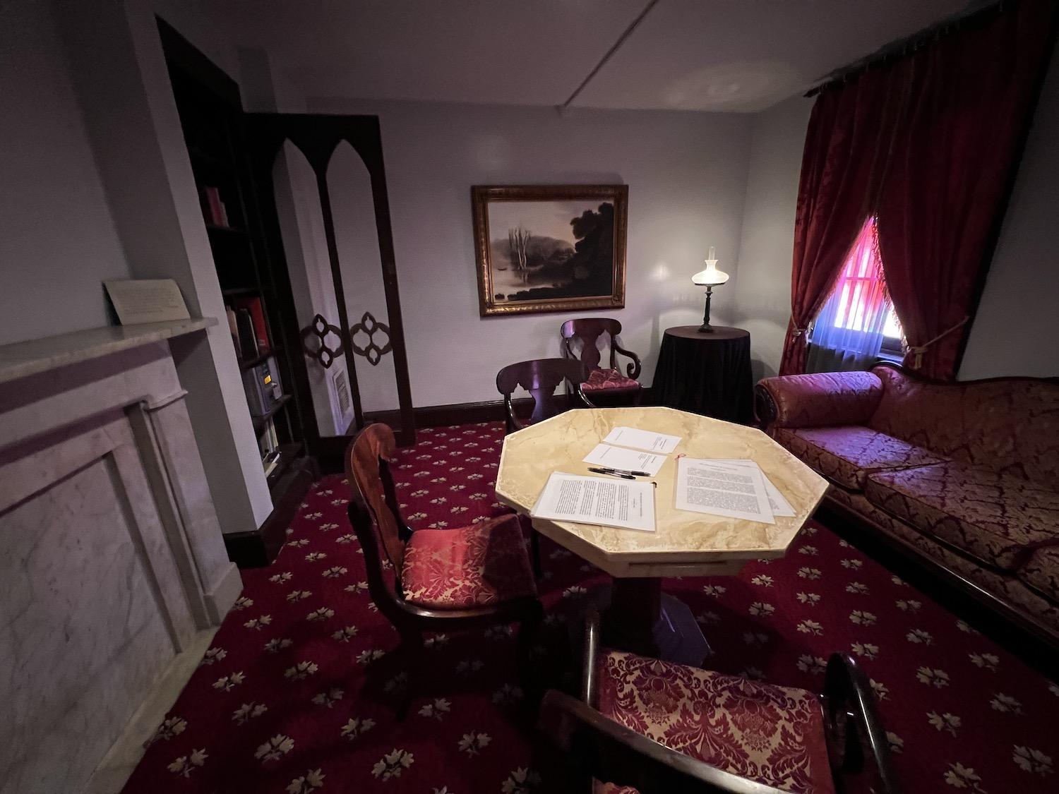 In contrast to the unfurnished former home of Edgar Allan Poe, the "Reading Room" in an adjoining building has been furnished in honour of one of his fictional essays.