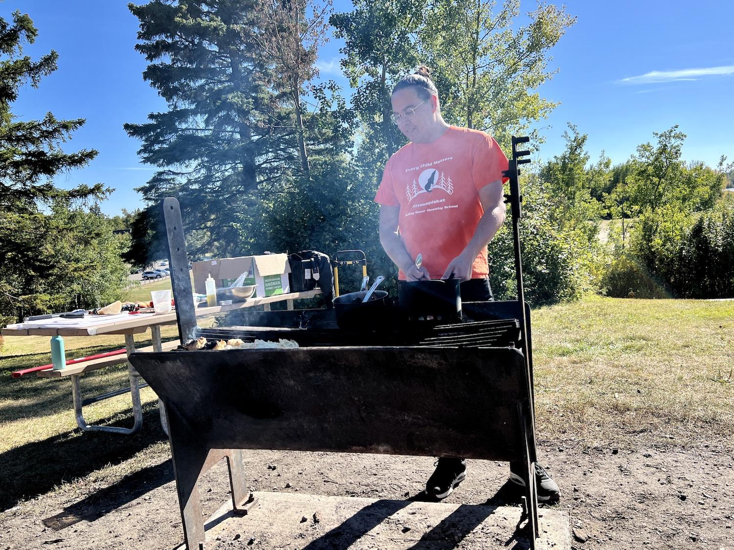 Edmonton chef Scott Jonathan Iserhoff of Pei Pei Chei Ow cooks in Elk Island National Park.