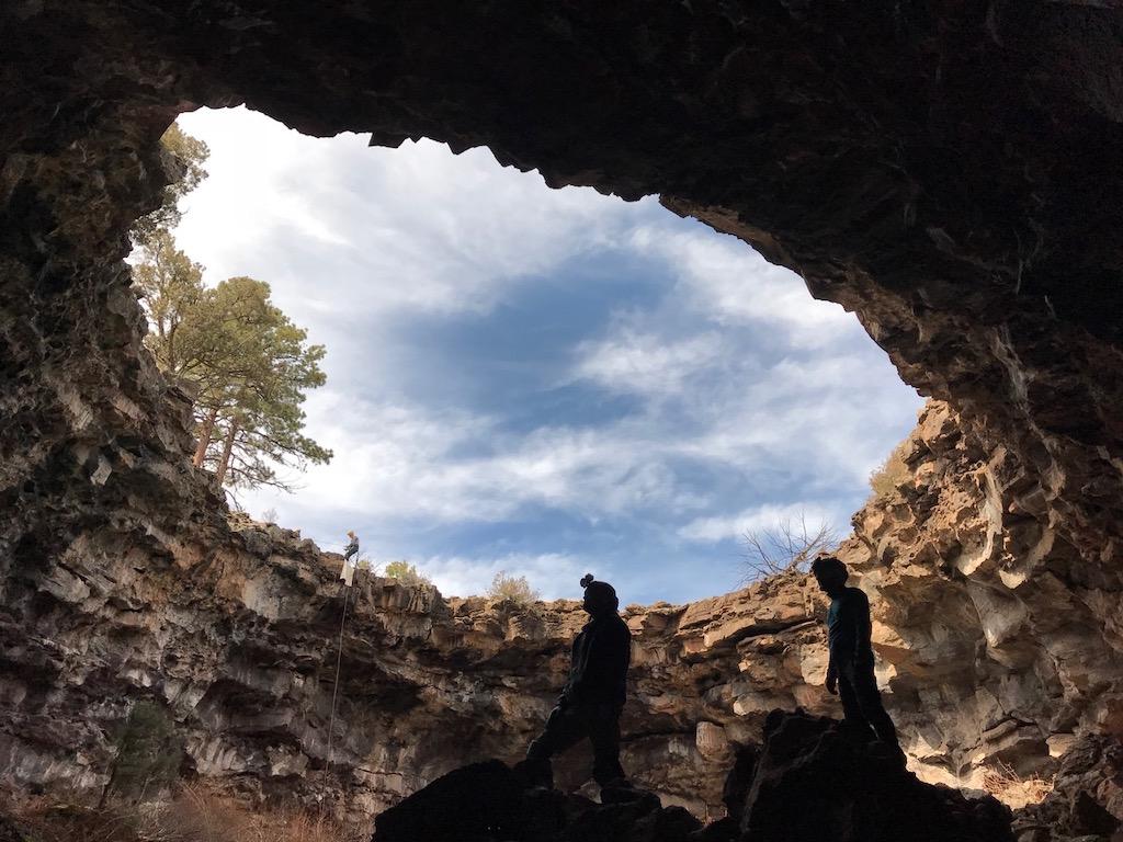 Researchers descend into one of the lava tubes/Bogdan Onac via University of South Florida