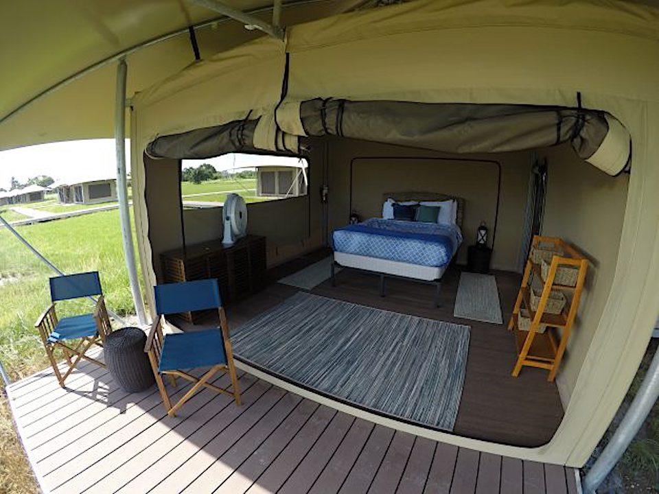 The eco-tents come complete with bed, fan, and mosquito netting.