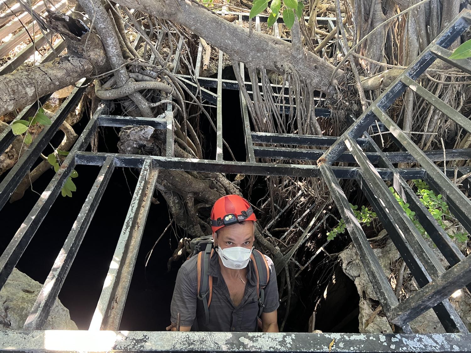 The cave at Fountain Cavern National Park in Anguilla is currently closed, but bat expert Baptiste Angin from Guadeloupe enters it while visiting the Anguilla National Trust to do research.