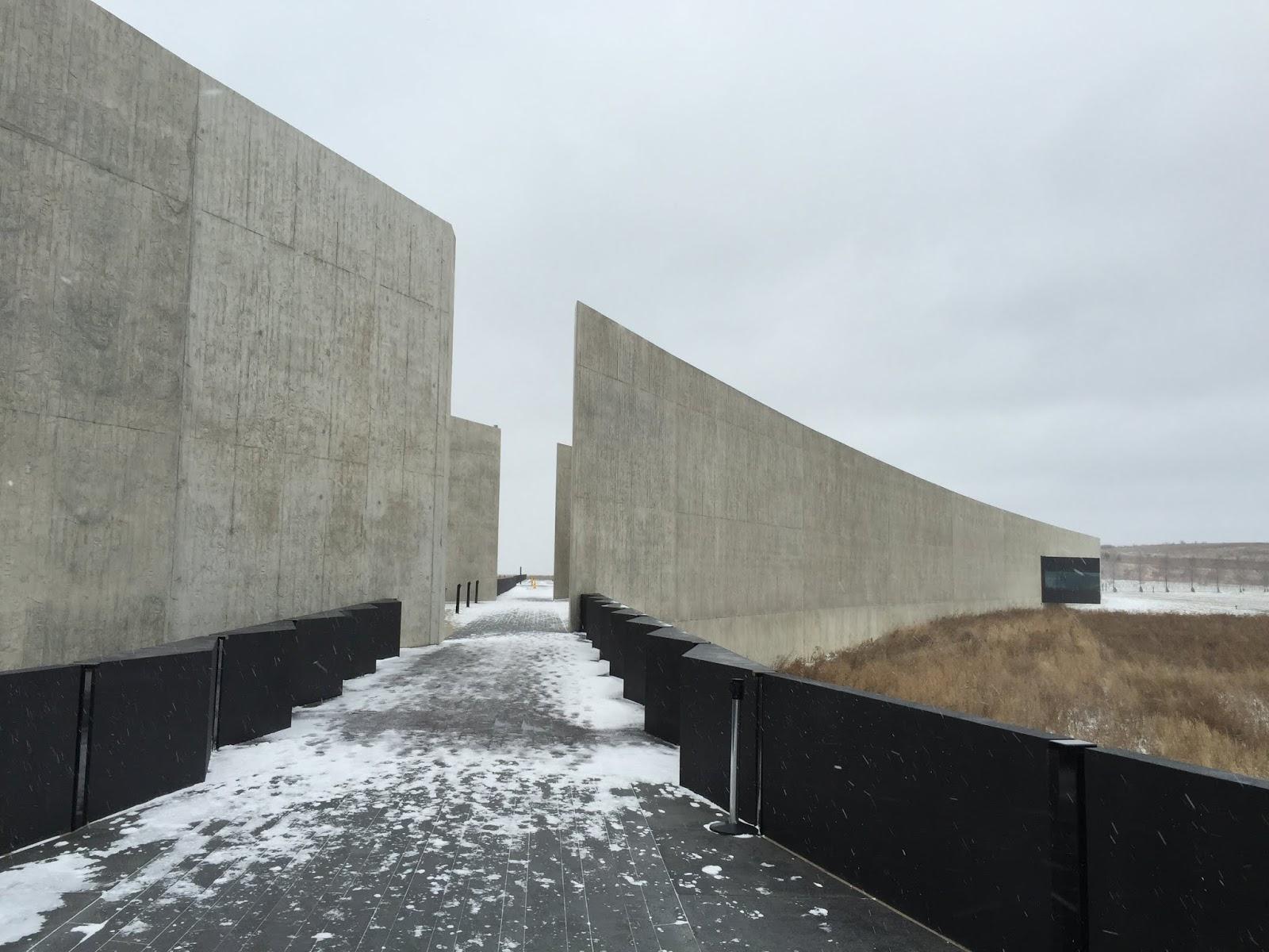 Concrete walls reflect the glide path of the doomed jet/NPS