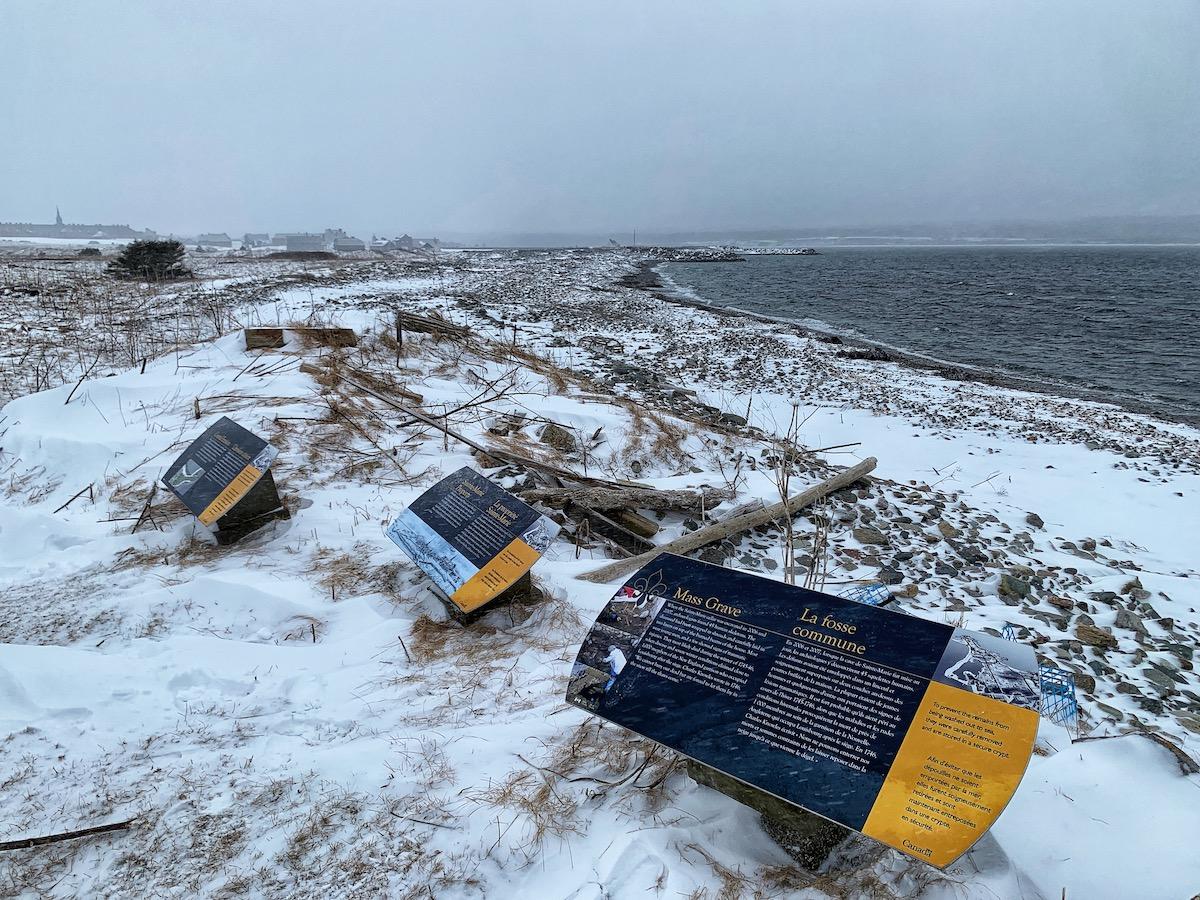 These three interpretive panels speak to coastal erosion and the mass graves found here.