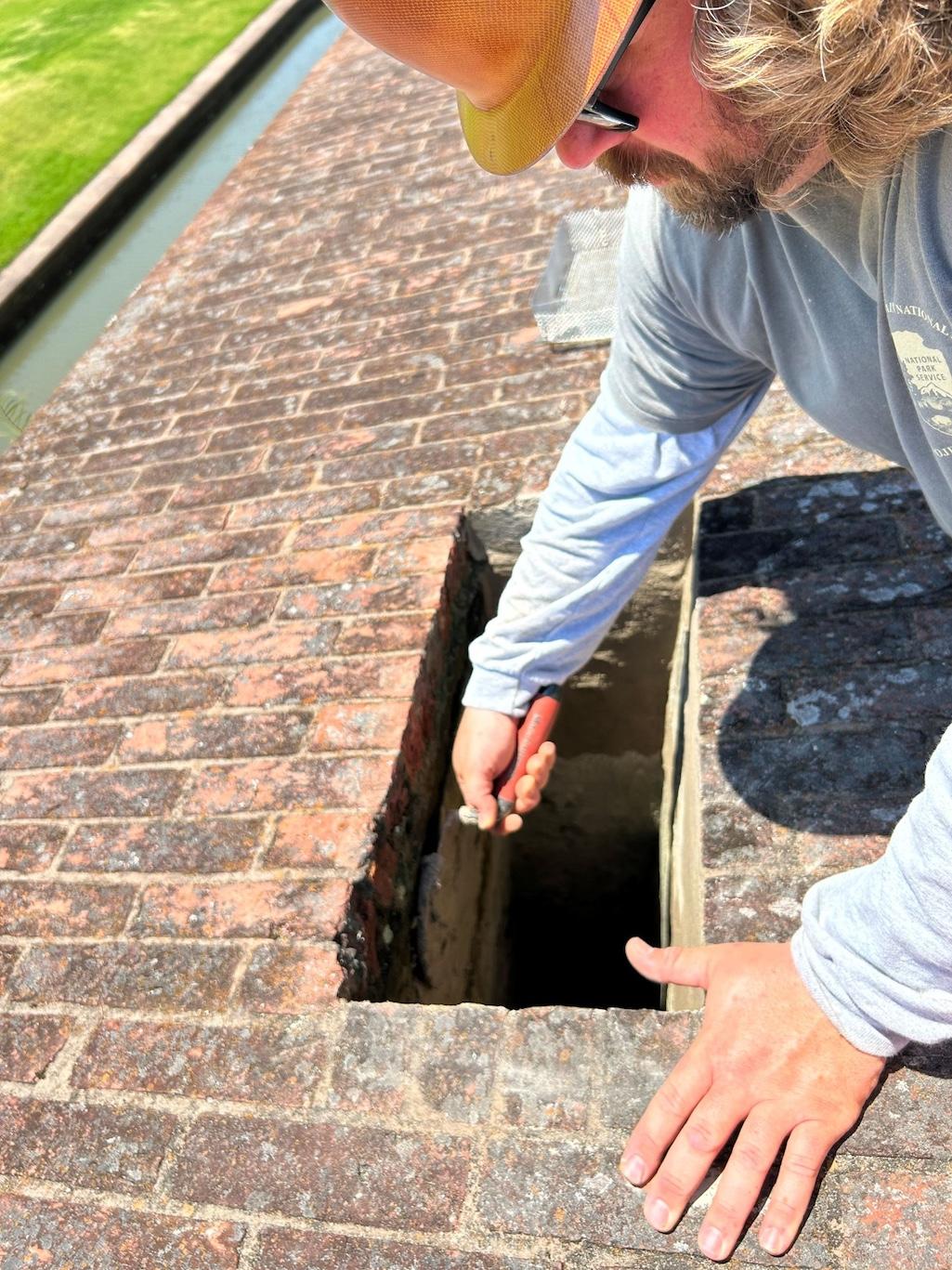 An HPTC employee, Chris Engel, conducts repair work at Fort Fort Pulaski National Monument. NPS Photo. NPS Photo