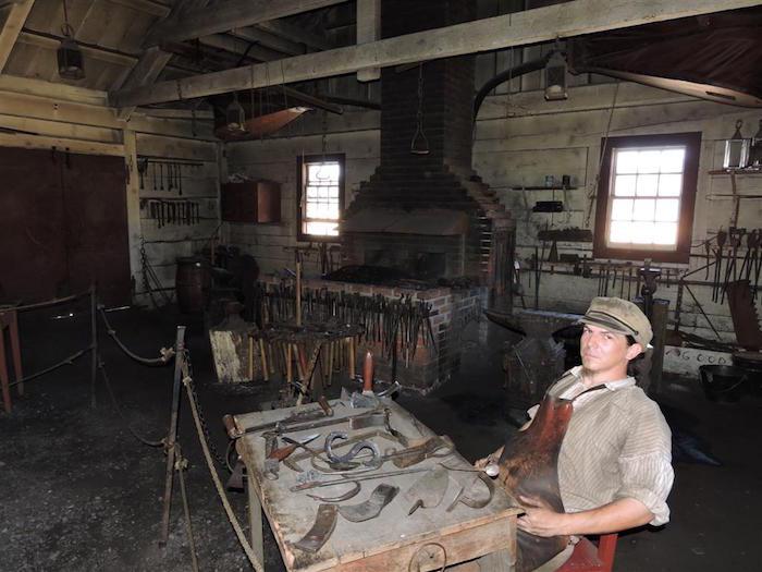 Volunteer in the blacksmith shop at Fort Vancouver/Lee Dalton