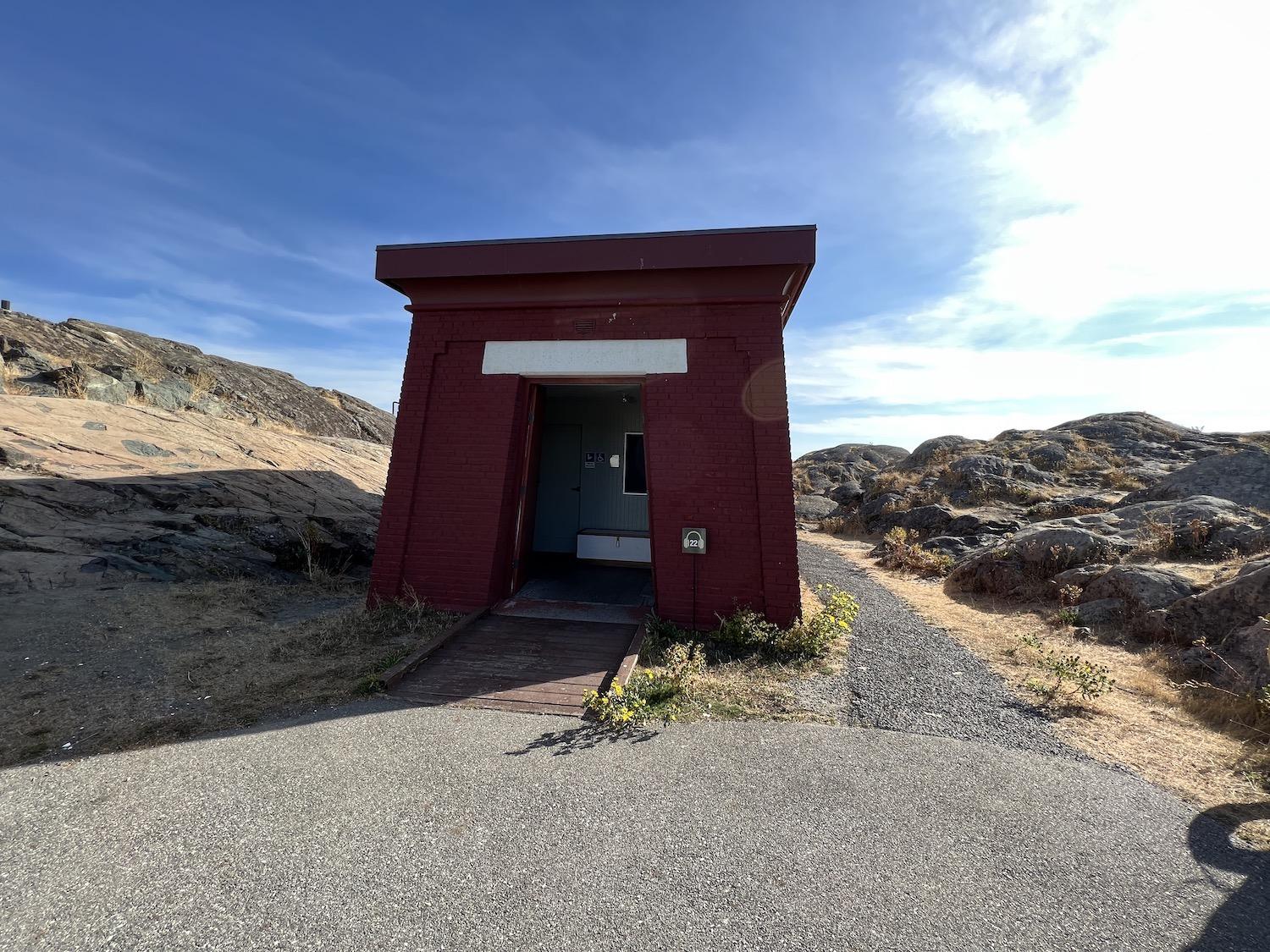 This public toilet features a splash of red at Fort Rodd Hill and Fisgard Lighthouse National Historic Sites.