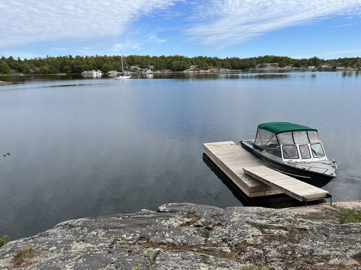 I'm ferried around Beausoleil Island's north end in a Parks Canada boat.