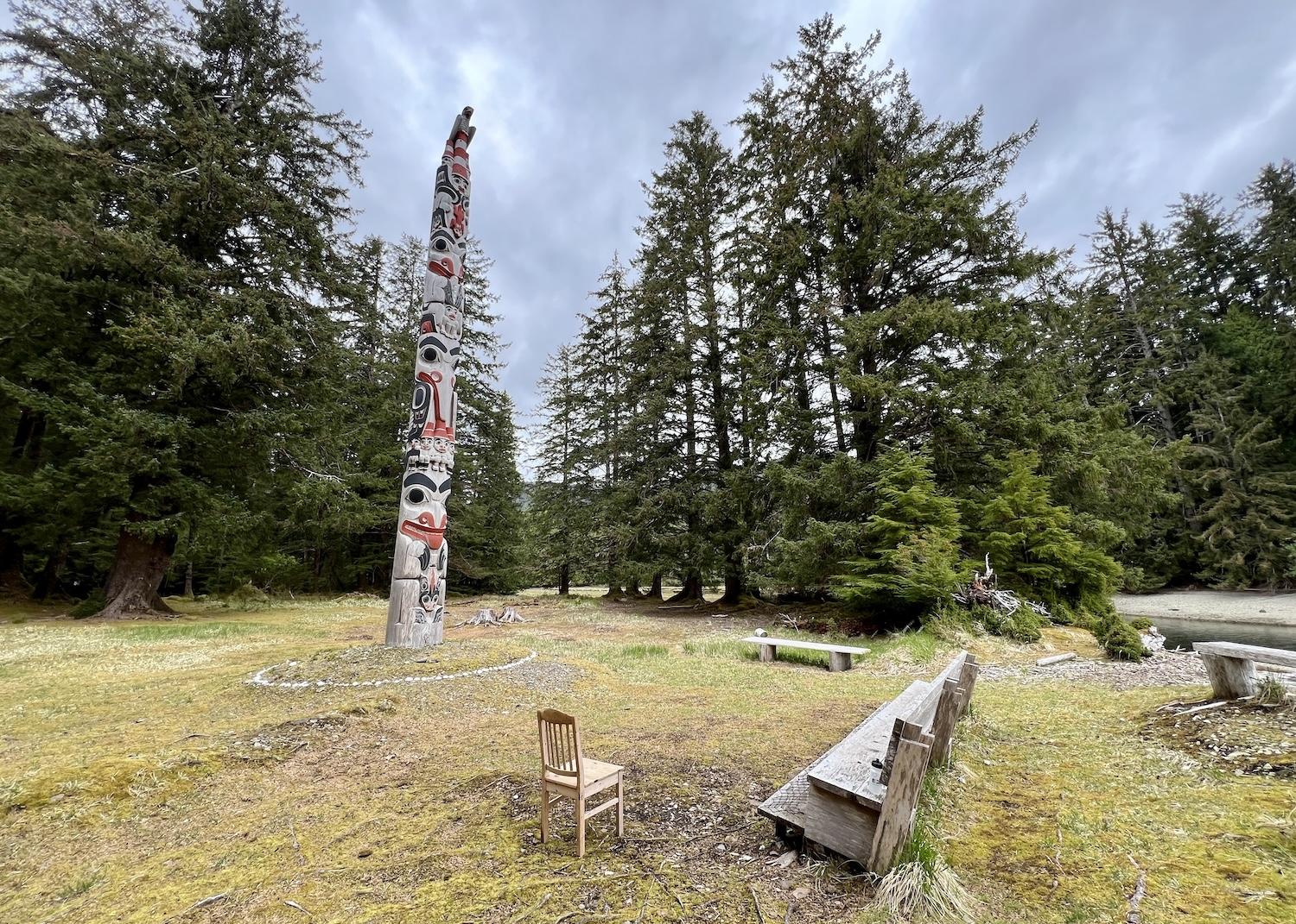 The Gwaii Haanas Legacy Pole stands at G̱andll K’in Gwaay.yaay (Hotspring Island) in northern British Columbia.