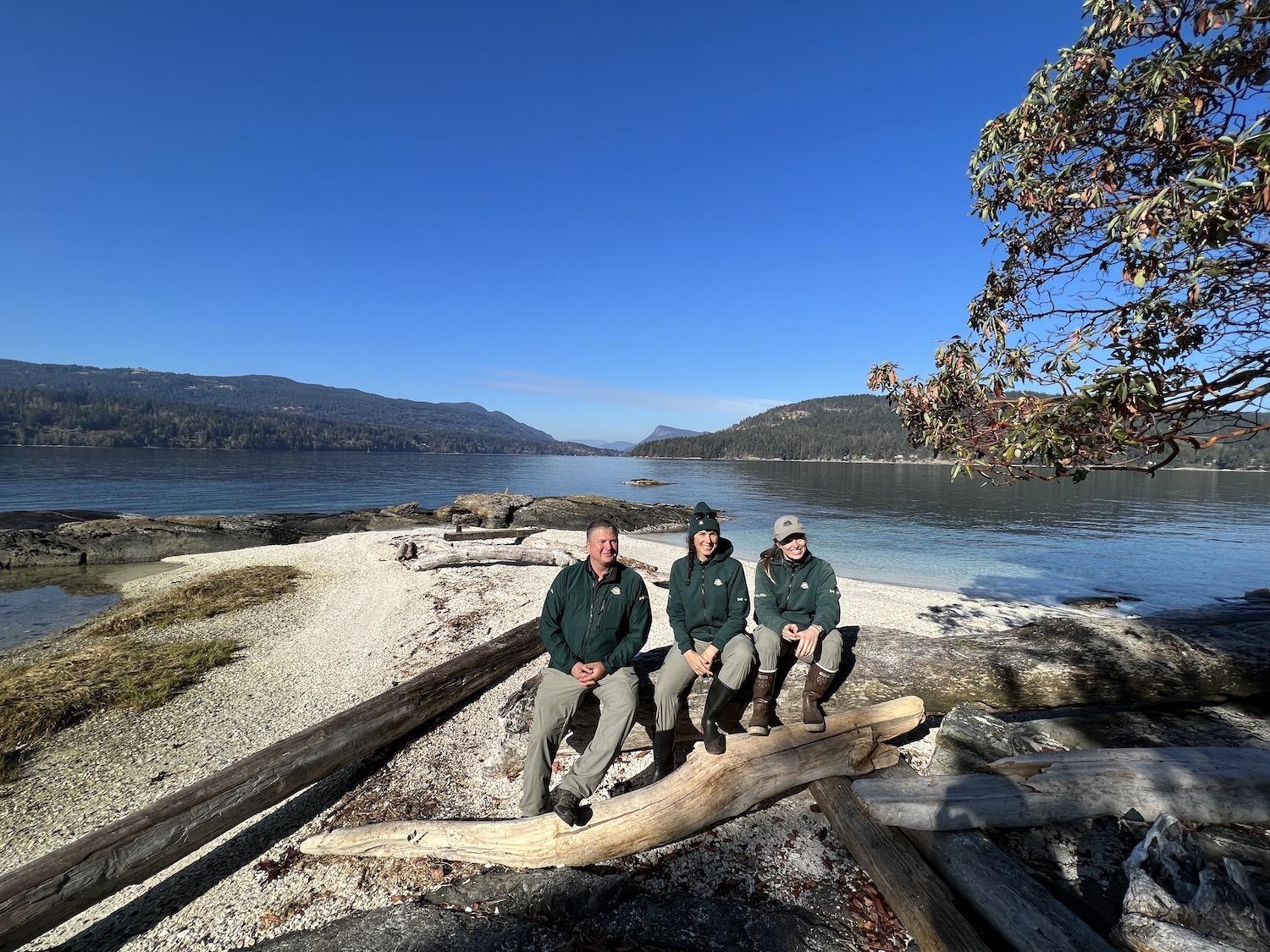 Parks Canada's Ben Tooby, Molly Clarkson and Kirsten Mathison are shown on Russell Island in Gulf Islands National Park Reserve. 