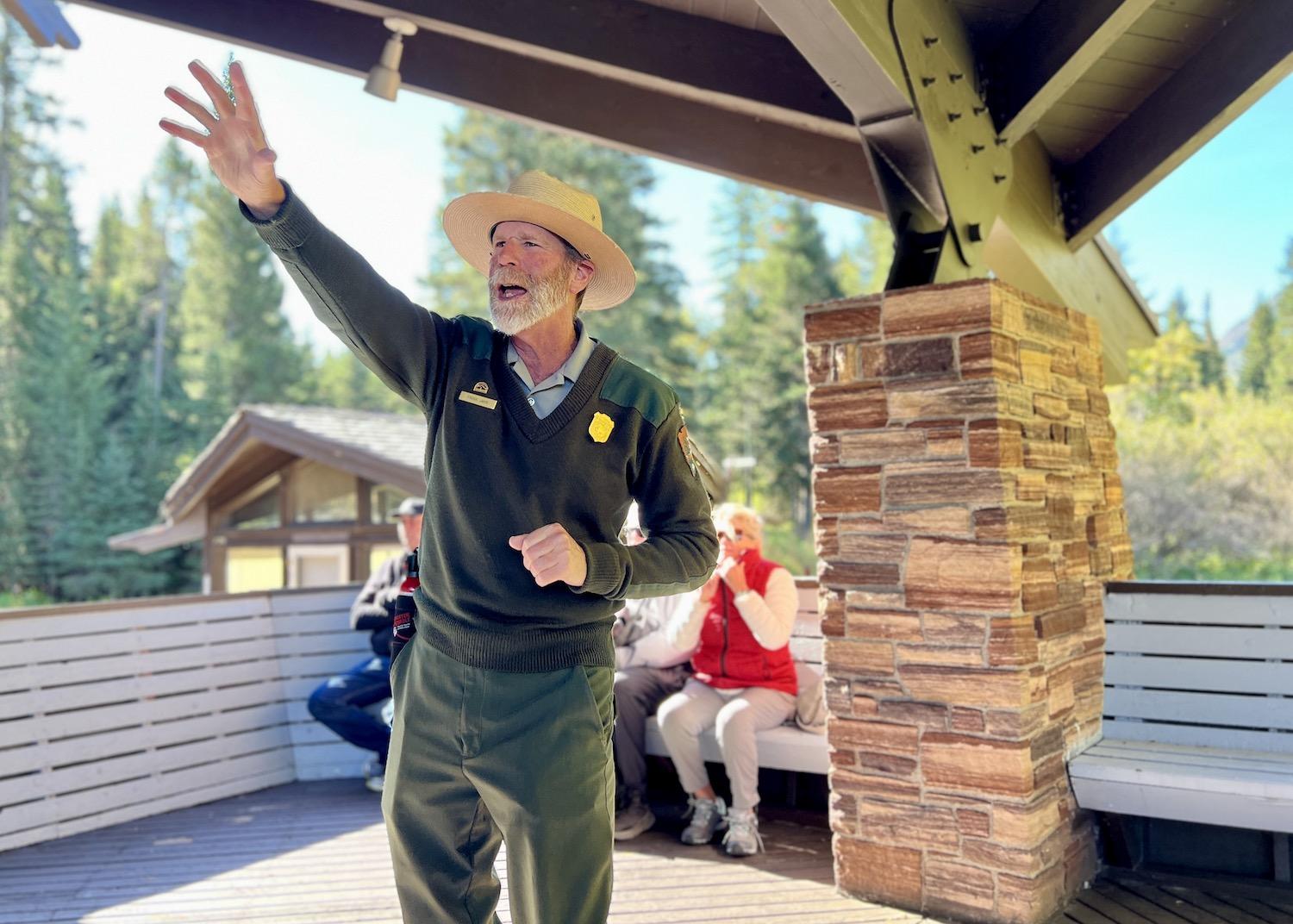 Ranger Frank Jahn gives an animated but brief talk at Goat Haunt's Snowflake Pavilion.