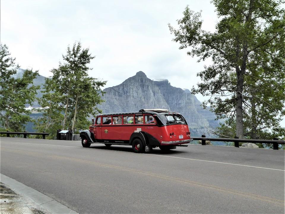 Red jammers at Glacier National Park are operated by Xanterra Parks & Resorts/David and Kay Scott