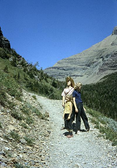 Mom and Sisters Hiking Toward Ptarmigan Tunnel, Glacier National Park /  John Latson