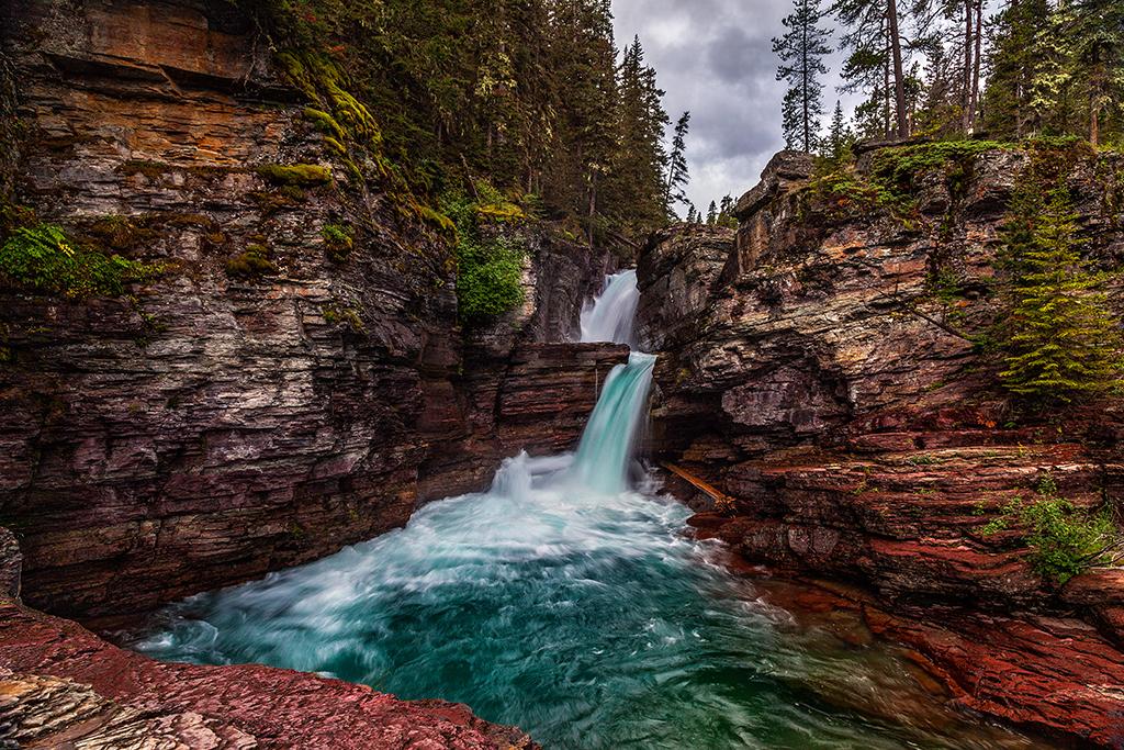 St. Mary Falls on a rainy day, Glacier National Park / Rebecca Latson