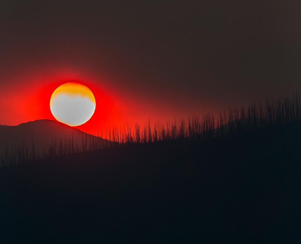 A telephoto sunset, Glacier National Park / Rebecca Latson