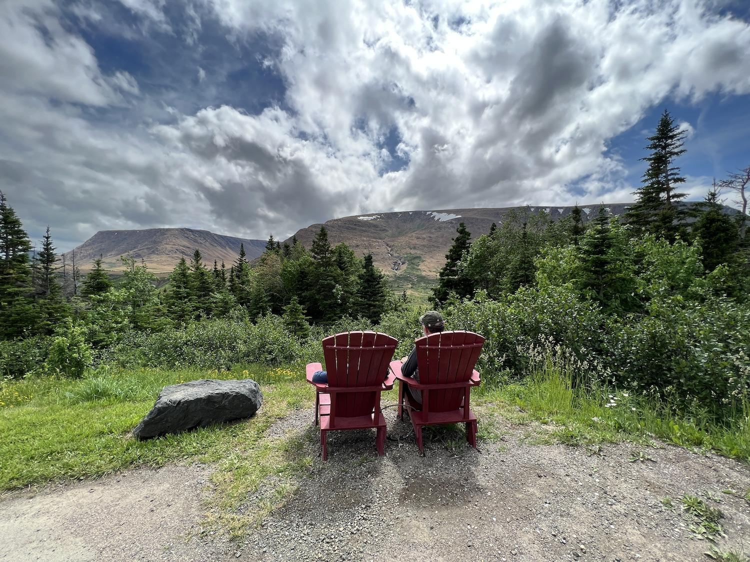 From two of Parks Canada's "Red Chairs," you can take in views of the Tablelands in Gros Morne National Park.