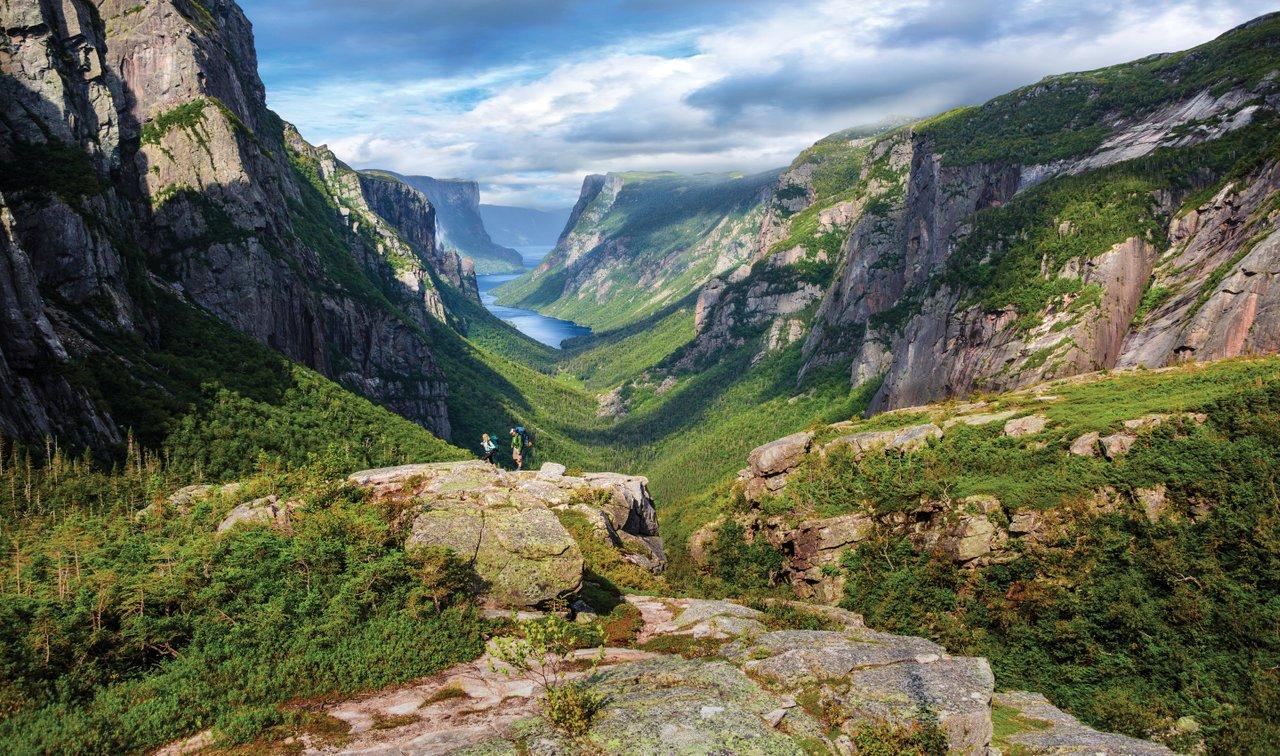 Hikers in Gros Morne's Western Brook Pond fjord.