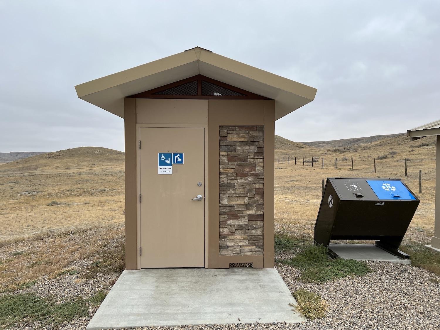 Stone is artfully worked into this outhouse in the West Block of Grasslands National Park.