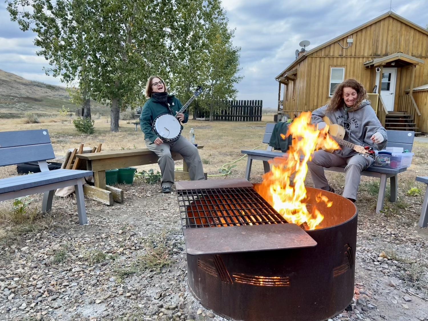 Parks Canada's Brenda Peterson, left, and Corelie Keller, lead a fireside chat at Rock Creek Campground.