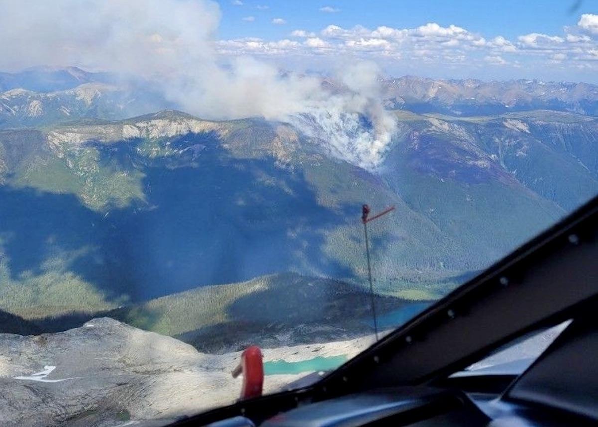 Parks Canada is monitoring the Uto Wildfire in British Columbia by helicopter.