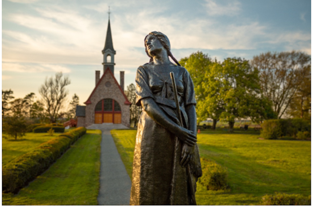 A statue of Evangeline (inspired by Henry Wadsworth Longfellow’s epic poem), is a centrepiece at Grand-Pré National Historic Site.