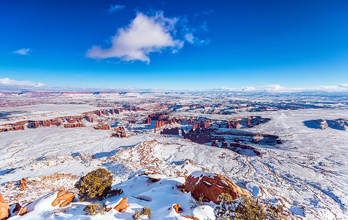 Winter's snowy grasp on Grand View Point, Canyonlands National Park / Rebecca Latson