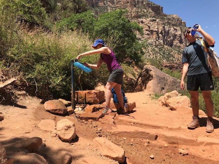 Filling water bottles along the Indian Gardens Trail at Grand Canyon NP/Rita Beamish