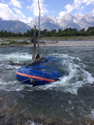 Raft snagged in Snake River in Grand Teton NP/NPS