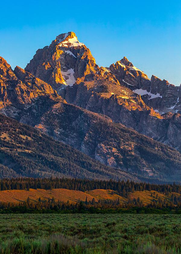 Sunrise over Grand Teton Mountain, Grand Teton National Park / Rebecca Latson