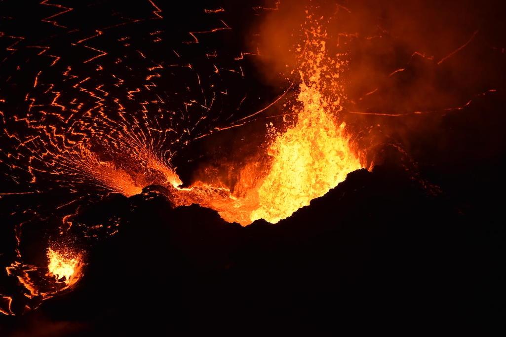 Much like New Year's fireworks, incandescent lava fountains in Halema‘uma‘u can be a beautiful display. This photo, taken on October 12, 2021, shows lava from the western vent in Halema‘uma‘u reaching heights of 10–15 meters (30–50 ft) and supplying lava 