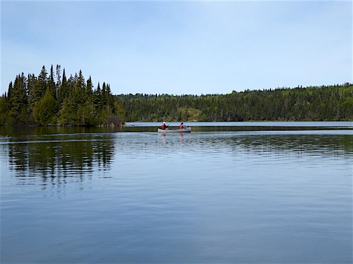 Canoeing across Tobin Bay at Isle Royale National Park/David and Kay Scott