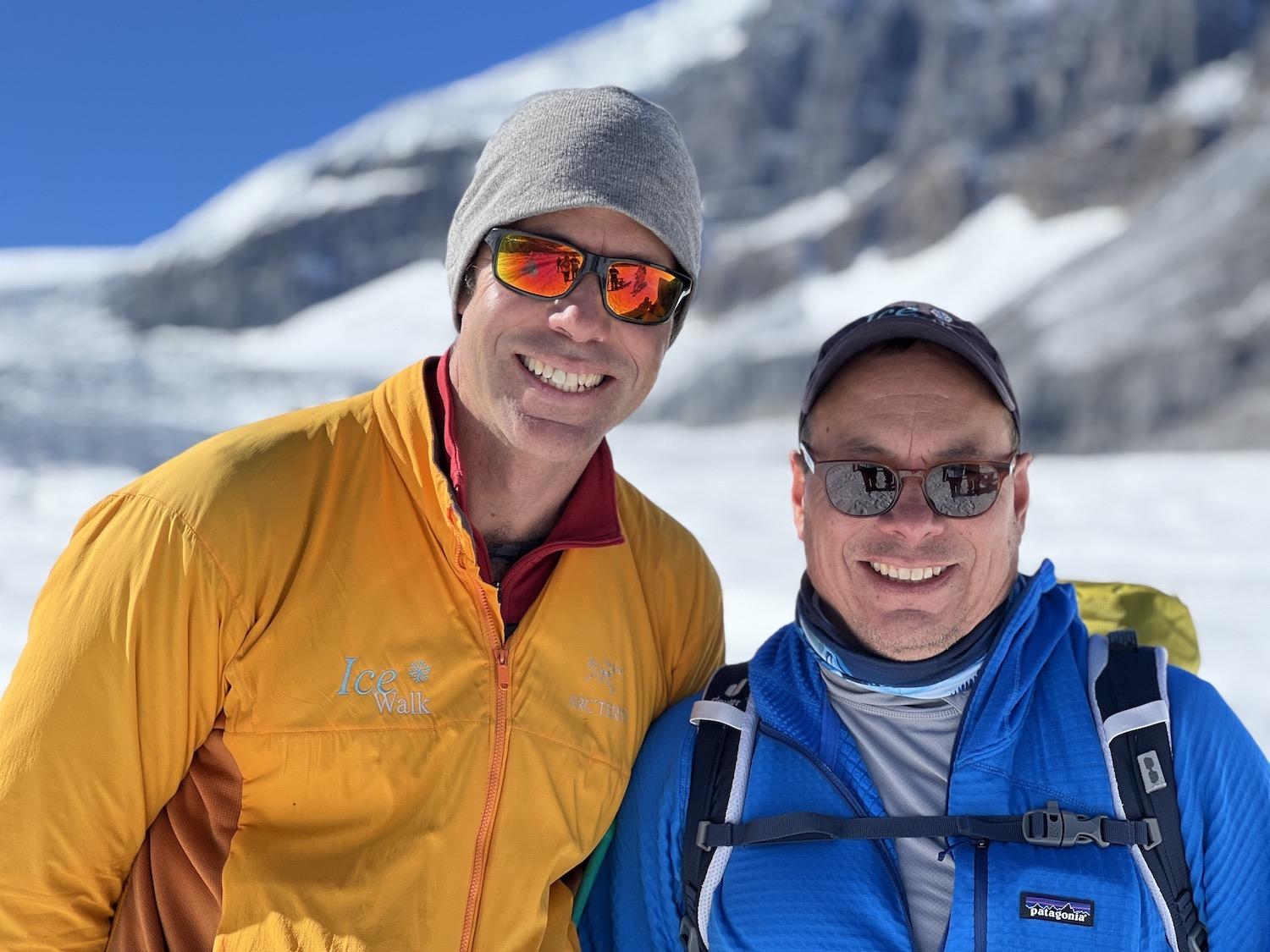 Corin Lohmann, left, of IceWalks partners with Tim Patterson, right, of Zucmin Guiding to offer an Indigenous perspective on the Athabasca Glacier.
