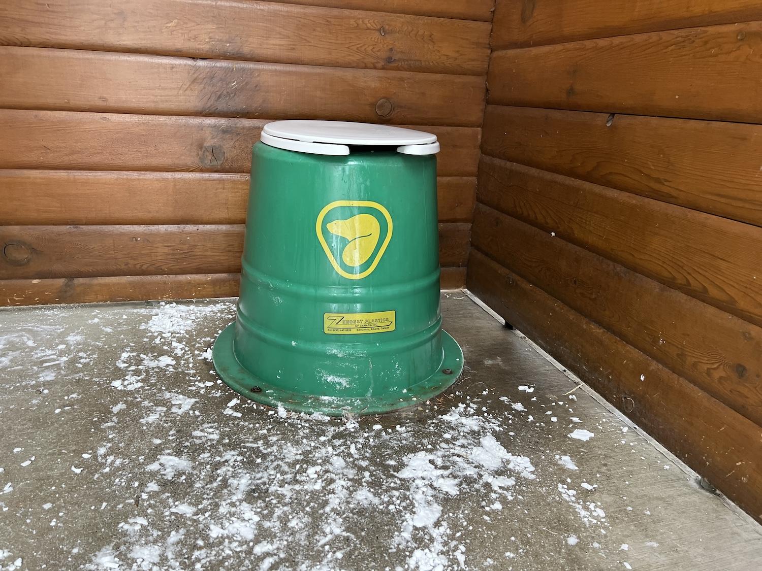It's hard to find Parks Canada-branded outhouse toilets, like this one in Jasper National Park.