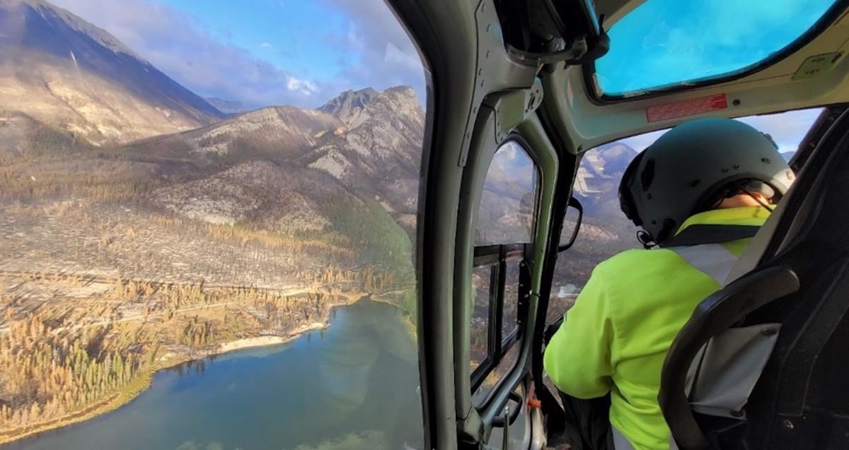 The fire crew at Jasper National Park monitors the Alberta park from a helicopter.